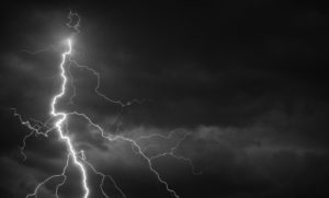 Fork-lightning-striking-down-during-summer-storm